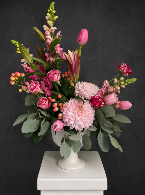 Pink flower arrangement with roses, chrysanthemums, snapdragons and tulips