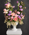 Purple and blush Garden Style Floral Arrangement with roses, tulipsand lisanthus