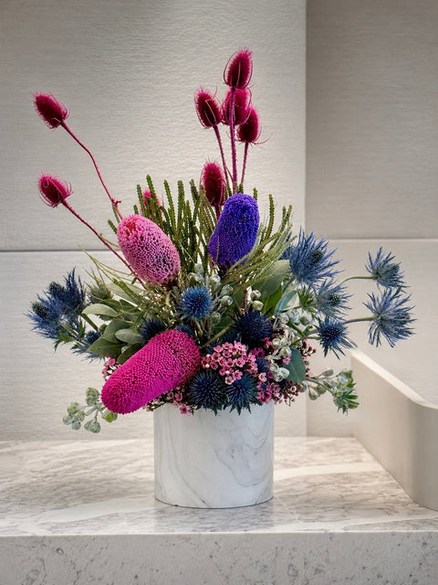 Bright Native Flowers at a corporate office in purple, pink and blue