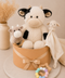 Featuring the irresistibly cuddly Wilbur the Cow Plush, the beautifully soft Lulu the Lamb Comfort Blanket, the handcrafted Crochet Cow Ring Rattle, and a premium Pastel Rainbow Silicone & Beechwood Teething Ring, this luxury baby hamper combines timeless keepsakes with practical essentials that babies and parents will adore.